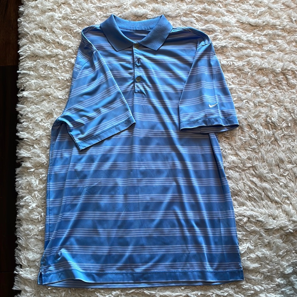 Blue and white striped Nike golf shirt. Perfect for a day out on the links.